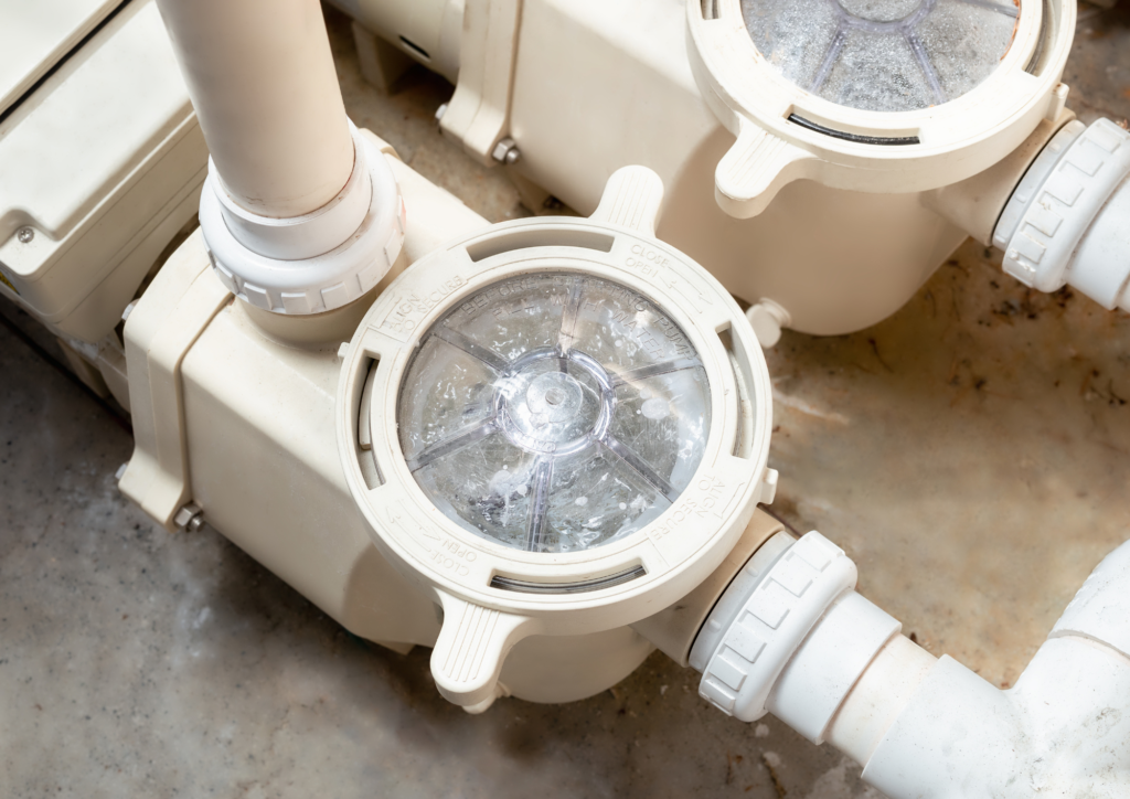 Residential swimming pool pump and filtration equipment close-up